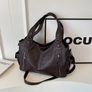 The Hidden Agenda Shoulder Bag