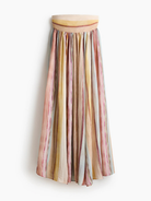 Pastel striped long dress hanging display
